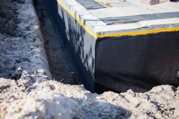 Professional Waterproofing technician working in Springfield, VA